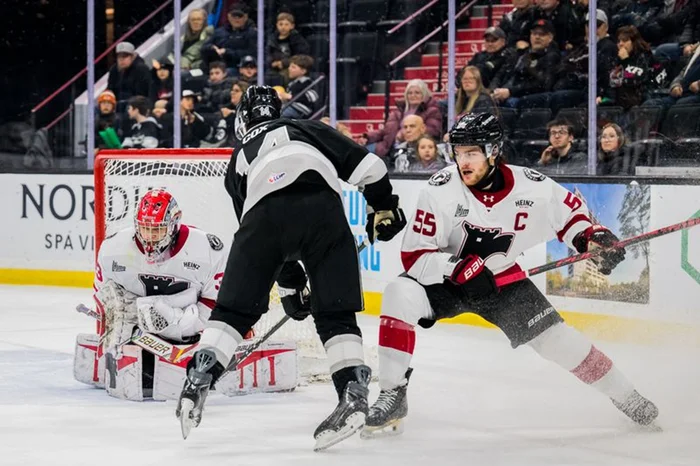 Ethan Cox tire sur Déniger.